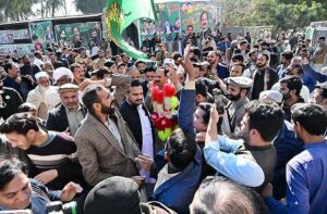 PML-N candidate Anjum Aqeel Khan with supporters celebrates after won the election for National Assembly constituency NA-46 Islamabad Capital Territory according to the unofficial result.