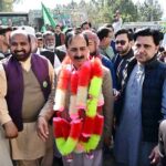 PML-N candidate Anjum Aqeel Khan with supporters celebrates after won the election for National Assembly constituency NA-46 Islamabad Capital Territory according to the unofficial result.