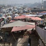 A view of encroachment on road causing problems for traffic and pedestrians at Pirwadhai.