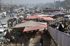 A view of encroachment on road causing problems for traffic and pedestrians at Pirwadhai.