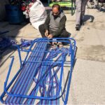Artisan busy making wooden bench at Banni Chowk