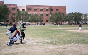 A view of Baseball match played between Fatima Jinnah Women University Rawalpindi and Kinnaird Lahore Women University Teams during All Pakistan Inter -University Women Baseball Championship 2024 at Government College Women University Faisalabad (GCWUF) Sports Ground.