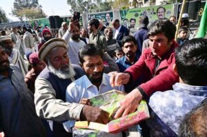 PML-N candidate Anjum Aqeel Khan with supporters celebrates after won the election for National Assembly constituency NA-46 Islamabad Capital Territory according to the unofficial result.