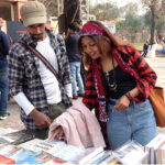 Women visiting stall during Faiz Mela at Al-Hamra