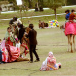 Families enjoying camel ride at Jilani Park