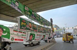 A view of banners of candidates displayed at Committee Chowk in connection with upcoming General Election 2024.
