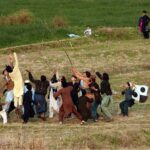 Children busy in catching up the lost kites in a ground at Tarlahi.