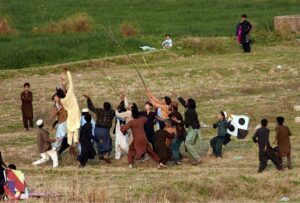 Children busy in catching up the lost kites in a ground at Tarlahi.