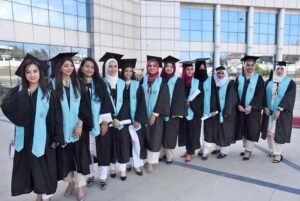 DG, FDE Tanveer Ahmed Principal Prof Rozina Faheem awarding Gold medal to a student in 3rd Convocation of FG Home Economics College F11/1