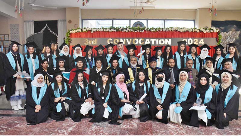 Graduate students pose for group photo with DG, FDE Tanveer Ahmed Principal Prof Rozina Faheem, after convocation at FG Home Economics College F11/1