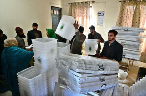 Polling staff receiving polling material for General Elections 2024 at G8 distribution Centre in the Federal Capital.