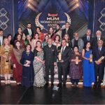President Arif Alvi, in a group photograph, with the organizers & recipients of the awards at the 5th edition of HUM Women Leaders Awards-2024 ceremony held at the Jinnah Convention Center