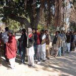 A large number of voters in queue to cast their vote outside a polling station during General Election-2024.