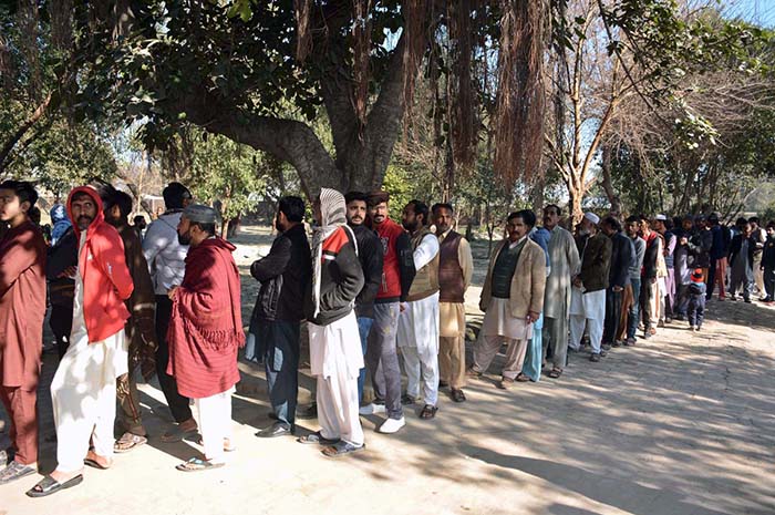 A large number of voters in queue to cast their vote outside a polling station during General Election-2024.
