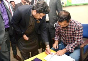 Governor Sindh Kamran Khan Tessori talking to media after casting his vote at a polling station during General Elections 2024.