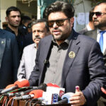Governor Sindh Kamran Khan Tessori talking to media after casting his vote at a polling station during General Elections 2024.