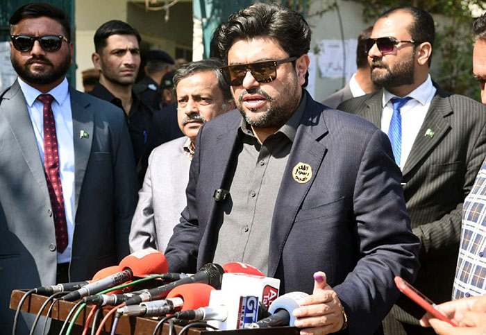 Governor Sindh Kamran Khan Tessori talking to media after casting his vote at a polling station during General Elections 2024.