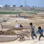 Labourers busy in preparing bricks at local kiln in outskirt of Federal Capital