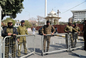 Police officials standing alert on the occasion of the election of Speaker and Deputy Speaker in the Punjab Assembly