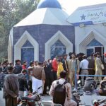 A large number of people standing in queue outside Police Service Center to get their driving license at D-Ground.