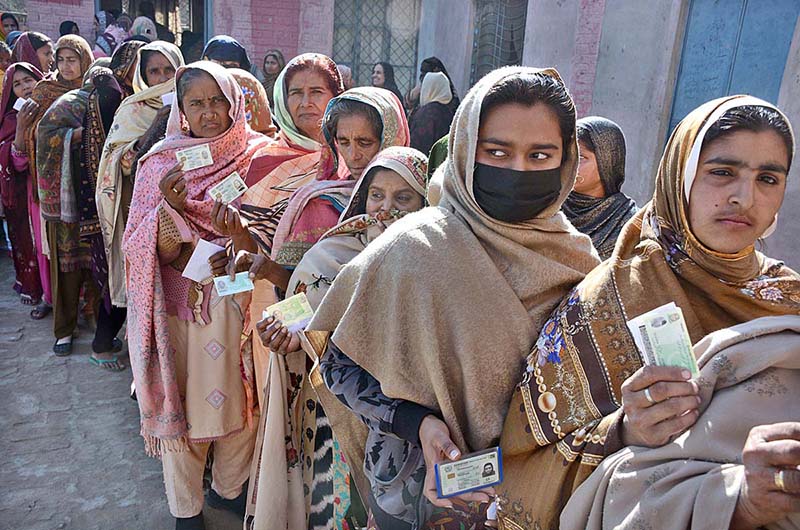 A large number of women in queue outside a polling station to cast their vote during General Election-2024