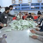 Polling officials counting vote in a polling stations during General Elections 2024