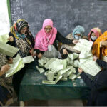 Polling officials counting vote in a polling stations during General Elections 2024