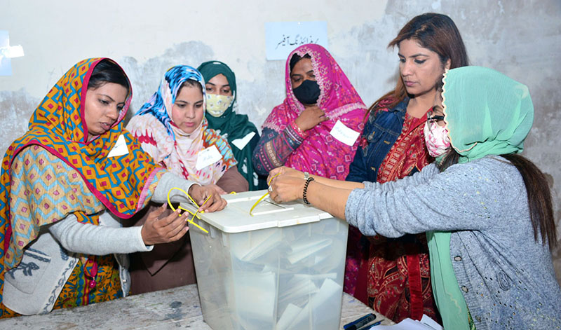 Polling officials counting vote in a polling stations during General Elections 2024