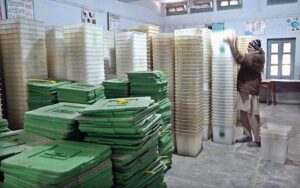 Polling staff receiving polling material at distribution Centre for General Elections 2024.