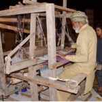 An artisan demonstrating his skills during the Bleu fair organized by the Women Chamber of Commerce