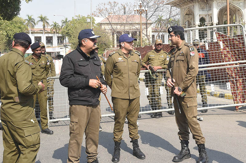 Police officials standing alert on the occasion of the election of Speaker and Deputy Speaker in the Punjab Assembly