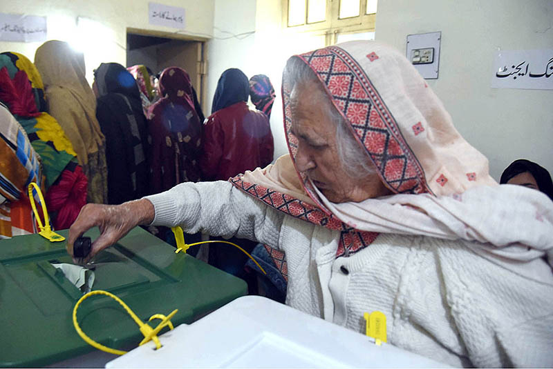 Polling officials open ballot boxes to count the votes at polling station Government Sardar Schoo Garhi Shahul during the General Election-2024