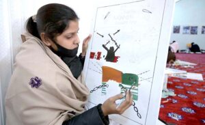 Students participating in painting competitions in connection to solidarity with the people of IOK on the eve of Kashmir Day organized by Sargodha Arts Council