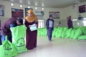 Polling staff receiving polling material at distribution Centre for General Elections 2024.