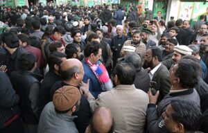 PML-N candidate Hanif Abbsi reacts to the supporters celebrating the success of securing the National Assembly seat NA-56 Rawalpindi according to unofficial result.
