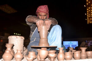 An artisan demonstrating his skills during the Bleu fair organized by the Women Chamber of Commerce