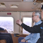 Caretaker Sindh Chief Minister Justice (R) Maqbool Baqar takes aerial view of on-going polling process in the city