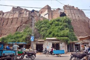 A view of damage wall of historical heritage Pakka Fort in the city.