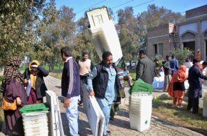 Polling staff receiving polling material at distribution Centre for General Elections 2024.