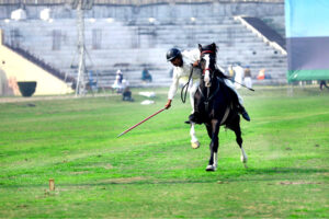A tent pegger aiming his target in the Chief Minister Tent Pegging Championship 2024 organized by PHA