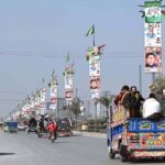 View of different political parties posters and banners displayed on street lights in preparation of General Election-2024 in Provincial Capital.