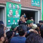 PML-N candidate Hanif Abbsi reacts to the supporters celebrating the success of securing the National Assembly seat NA-56 Rawalpindi according to unofficial result.