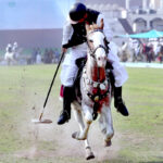 A tent pegger successfully gets the peg at the Chief Minister Tent Pegging Championship 2024 organized by PHA