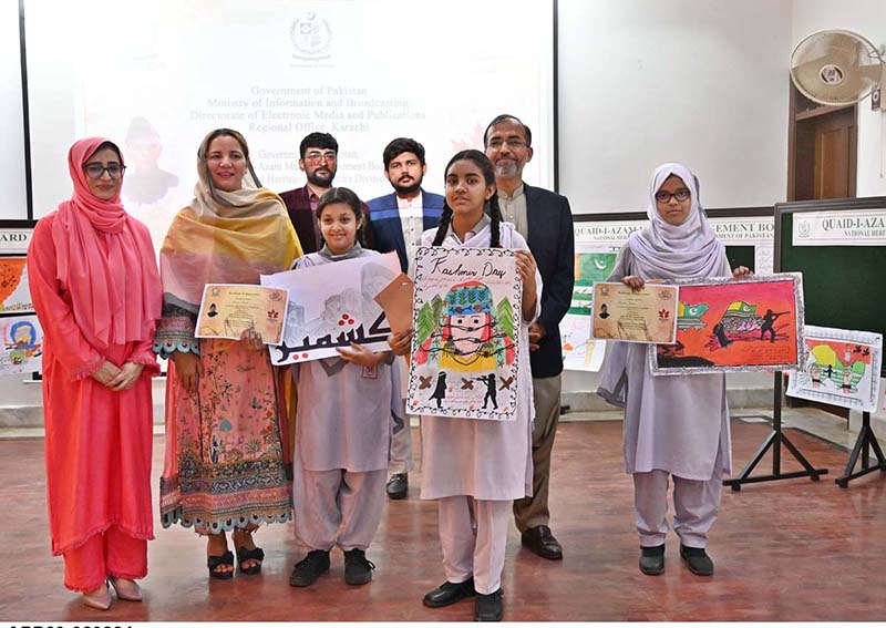Director General Press Information Department (PID) Karachi Ms. Erum Tanveer in a group photo along with student of position holders of Intra –School Arts Competition in connection of Kashmir Day at Quaid –i-Azam Mazar organized by Government of Pakistan Ministry of Information and Broadcasting Directorate of Electronic Media and Publications, National Heritage and Culture Division
