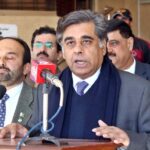 Caretaker Federal Minister for Commerce and Interior Dr. Gohar Ejaz addressing a press conference after chairing a consultative meeting to review the polls preparation and law and order