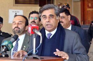 Caretaker Federal Minister for Commerce and Interior Dr. Gohar Ejaz addressing a press conference after chairing a consultative meeting to review the polls preparation and law and order