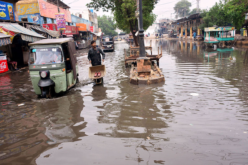 A view of rain water accumulated on the railway station road after rain in the city