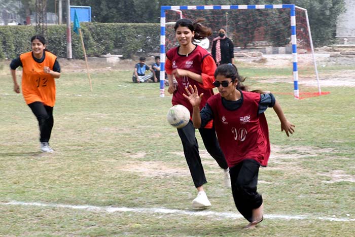 Players of different Colleges in action during trials for Larkana Region Girls Handball teams in connection with the Prime Minister Youth Sports League, organized by HEC at Shaheed Mohtarma Benazir Bhutto Medical University.