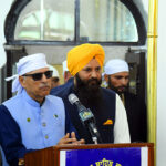 President Dr Arif Alvi addressing the members of the Sikh community and Yatrees, during his visit to Kartarpur Corridor