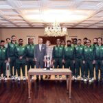 President Dr Arif Alvi, in a group photograph, with players and management of the Pakistan Blind Cricket team at Aiwan-e-Sadr